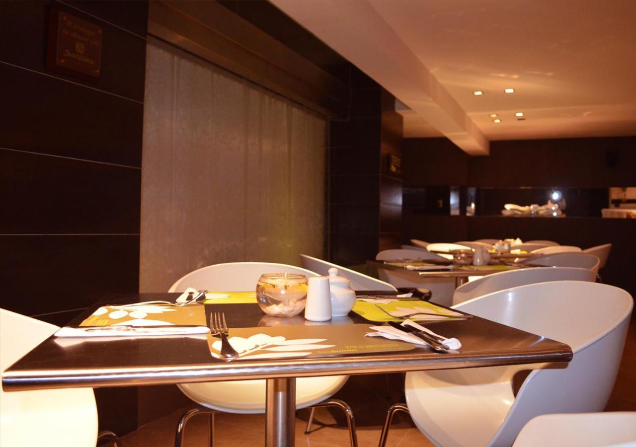 San Simon Hotel Pereira By Soratama Εξωτερικό φωτογραφία The interior of the restaurant