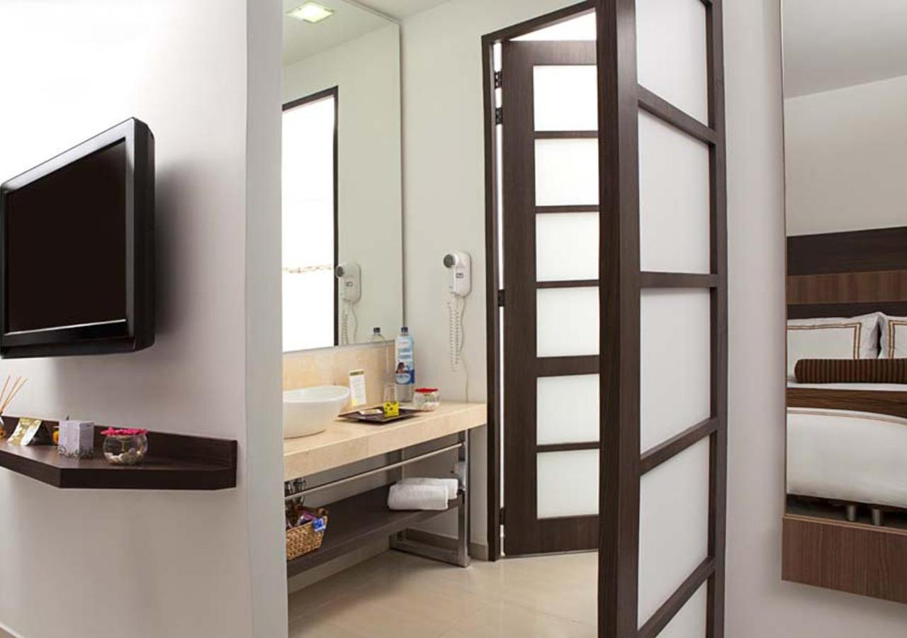 San Simon Hotel Pereira By Soratama Εξωτερικό φωτογραφία A room at the hotel