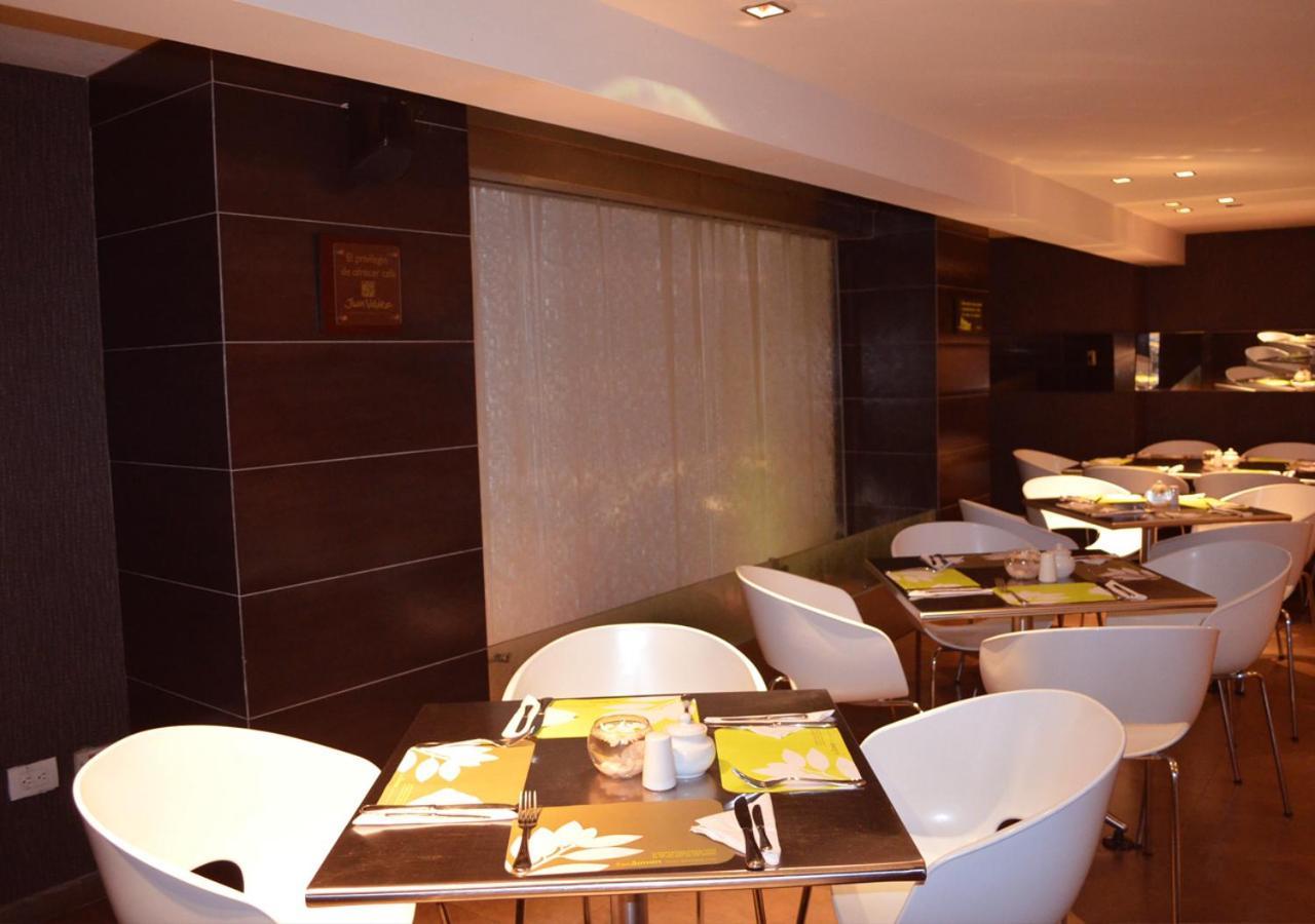San Simon Hotel Pereira By Soratama Εξωτερικό φωτογραφία The interior of the restaurant
